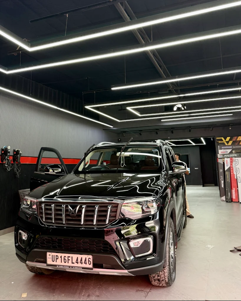 Graphene coating result on dark car — AutoMeisters Noida