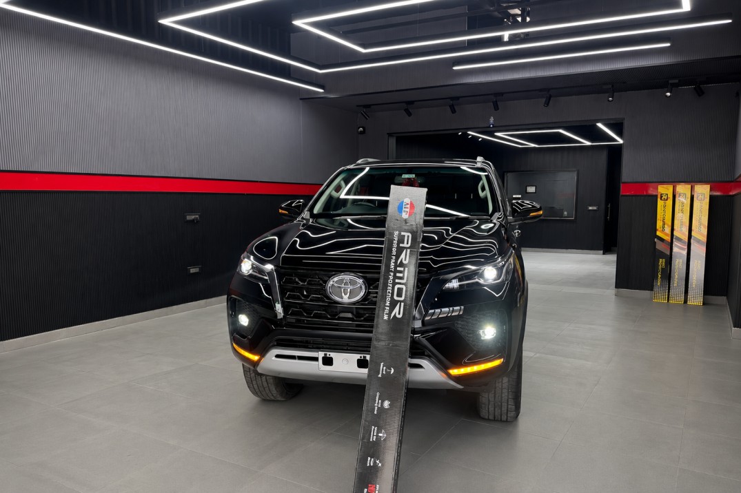 Paint Protection Film installation on white SUV — AutoMeisters Noida